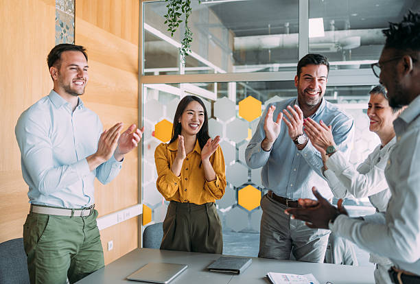 istock Cheerful entrepreneurs celebrating success in the office. 2233172872