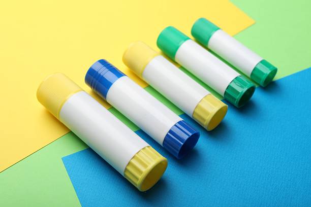 istock Many sticks of glue on color background 2233173143