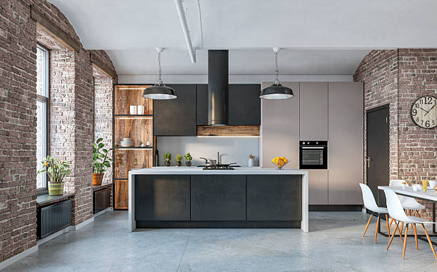 istock Modern industrial-style kitchen interior, brick walls, beige and black cabinets, large windows, kitchen island and dining area on cement floor 2233173924