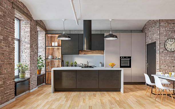 istock Modern industrial-style kitchen interior, brick walls, beige and black cabinets, large windows, kitchen island and dining area, decoration on hardwood floor 2233173932
