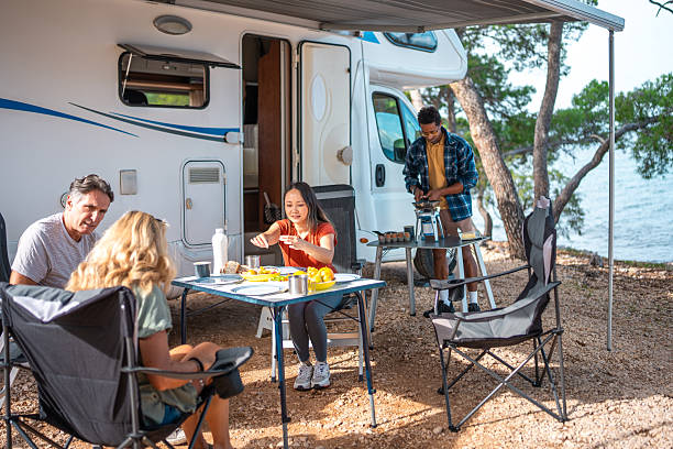 istock Multicultural Friends Gather for Breakfast Near Coastal Motor Home 2233174506