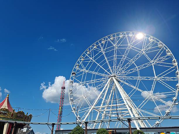 istock Magical Fairground: Colorful Ferris Wheel Illuminated Against Twilight Sky 2233178056