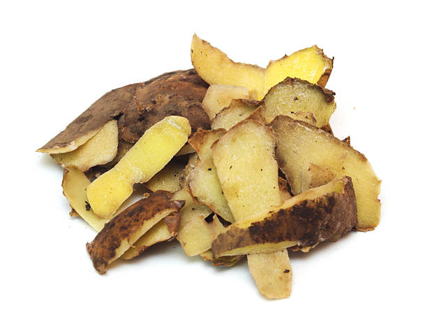 Pile of potato peels isolated on white background