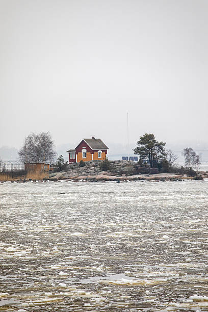Katajanokanluoto is a tiny island in the Gulf of Finland a short distance from Helsinki Harbour. It is open to the public. On the island is two buildings: An old pilothouse and a shed that has been converted to a modern kitchen.