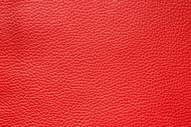 istock texture of red colored raw leather background 2233196092