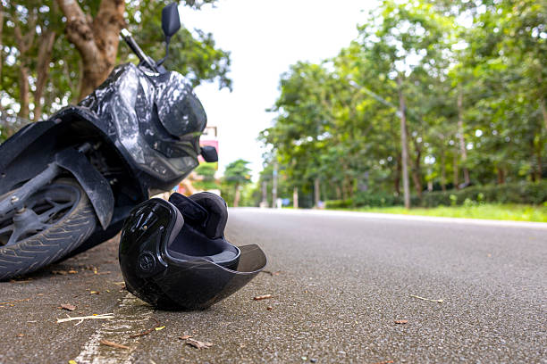 istock Motorcycle Accident Scene with Helmet 2233198380
