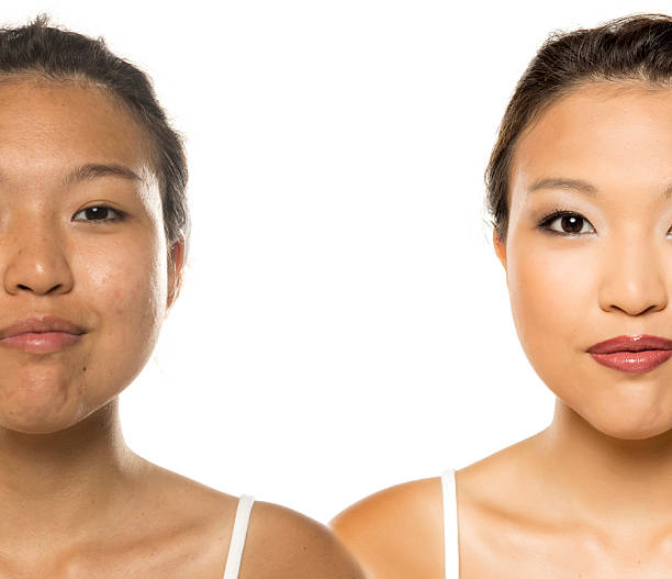 istock Comparative portrait of the same Asian woman before and after full makeup makeover, studio shot on white background. 2233202799