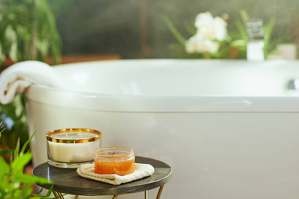istock Inviting Body Scrub and Candle for a Relaxing Bath 2233203978
