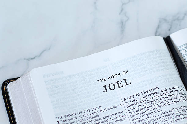 istock Joel bible book on white marble background 2233207497