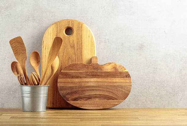 istock Wooden kitchen utensils on a wooden table. 2233209175