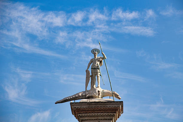 istock Statue of St. Theodore in Venice Against a Blue Sky. 2233211600