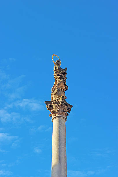istock View on Marian Column, Plague Column, Cesky Krumlov, Czech Republic 2233219611