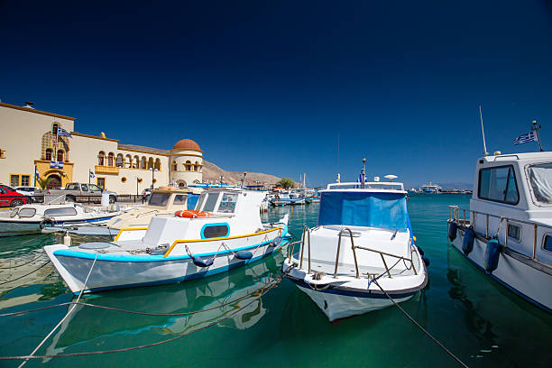 Leros, Greece - August 04, 2024 : Fishing boat in the port of Agia Marina village in Leros island in Greece