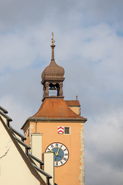 istock Clock tower near the Old Stone Bridge in Regensburg, Germany 2233233749