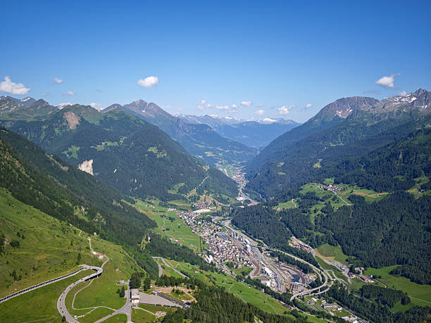 istock A Alps mountain range with a town in the valley below 2233234595
