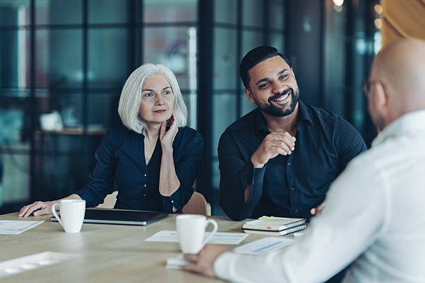 istock Group of entrepreneurs working together 2233238379