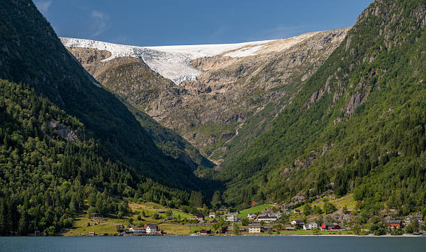 istock Village beneath glacier mountains in Norway 2233239894