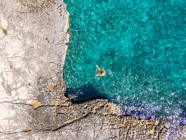 istock Best summer vacay, man relaxing in crystal clear bay 2233241179