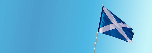 istock Scottish Flag Waving in the Sky 2233242960
