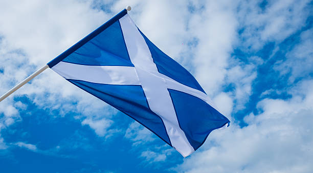 istock Scottish Flag Waving in the Sky 2233243132