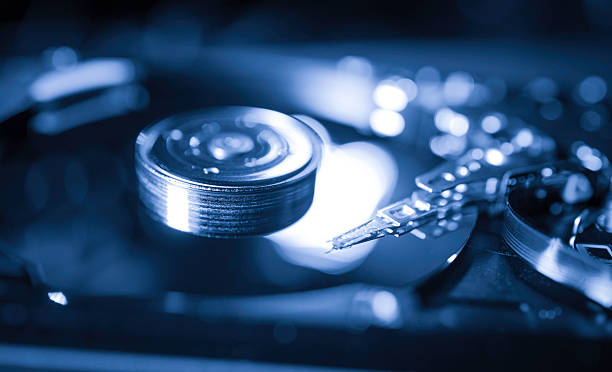 Close-up of hard drive internals showing disk and read-write head