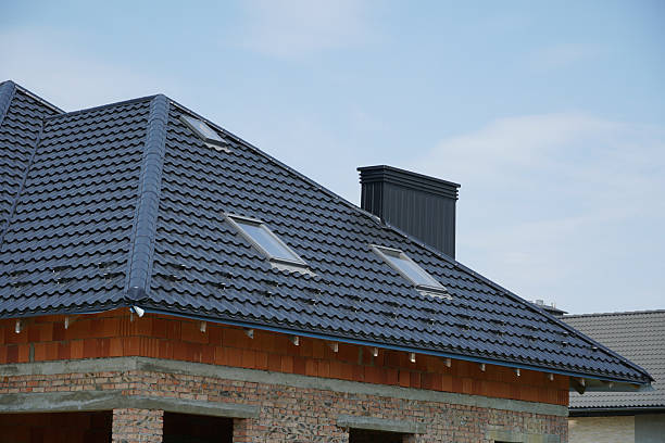 istock Roof construction featuring a modern design in a residential area during daytime with clear sky 2233248109