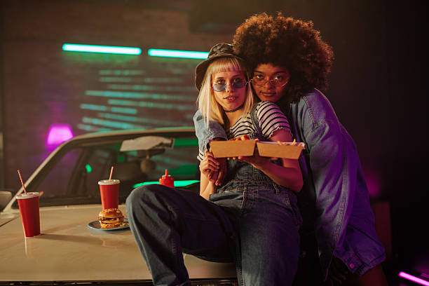 istock Stylish women bonding with takeout. 2233250167