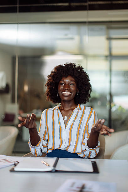 istock Professional Woman Sharing Ideas in a Modern Office Setting 2233252460