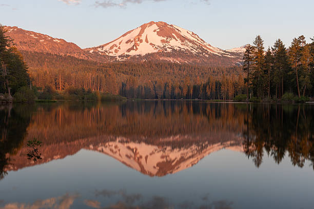 istock Alpenglow on Lassen peak reflected in Manzanita lake 2233254711