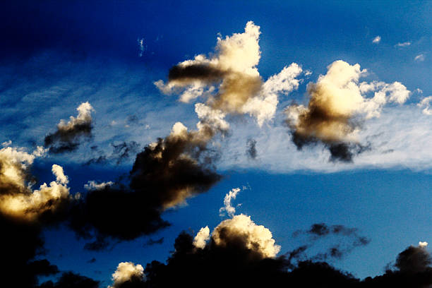 istock A striking contrast of light and shadow across the clouds 2233255461