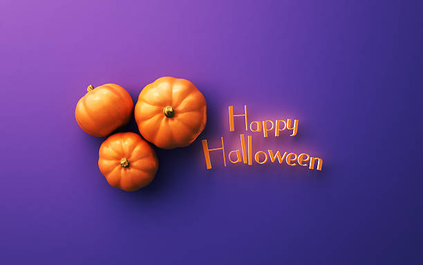 istock Jack O' Lantern pumpkins and Happy Halloween text on purple soft background 2233256956