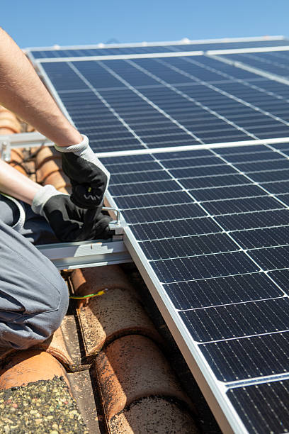 istock Solar panels installed on a rooftop in a sunny environment, demonstrating renewable energy usage for residential power needs 2233257482