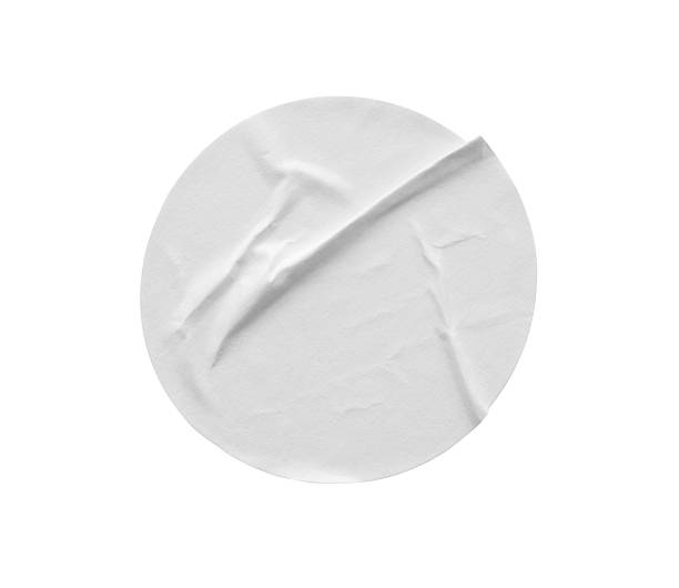 istock Blank white round paper sticker label isolated on white background 2233261649