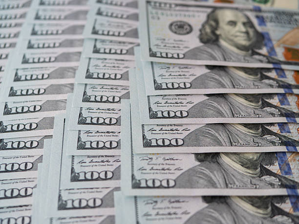 istock Stack of New Hundred Dollar Bills Close-Up Photography 2233262311