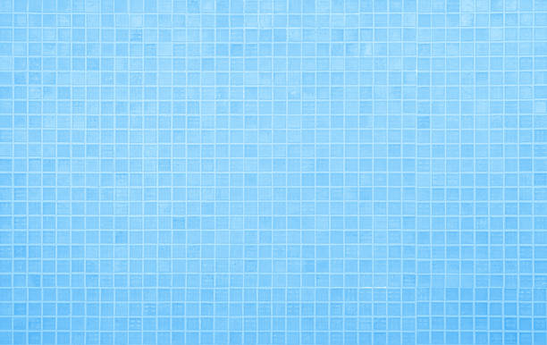 istock Blue light ceramic wall chequered and floor tiles mosaic background in bathroom, kitchen. Design pattern geometric with grid wallpaper texture decoration pool. Simple seamless abstract surface clean. 2233262594