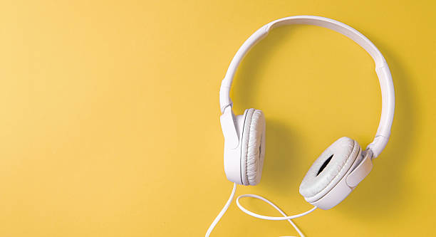 istock Banner with white headphones on lemon background copy space 2233262936