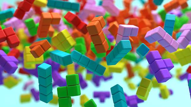 istock Tetromino blocks moving across the frame with blocks in the foreground and background on a surface 2233264065