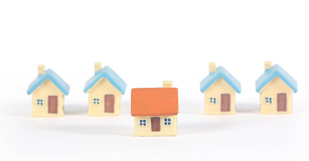 istock House Model Small size there space Residential Structure, home Business Concepts, and Success in Finance, Banking and Investment 2233273500
