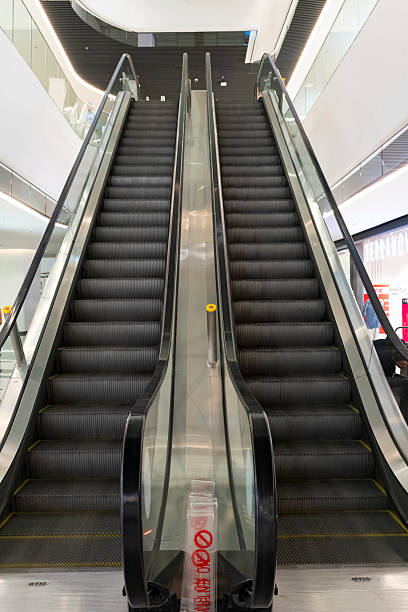 istock Modern Shopping Mall with Central Escalators 2233282420