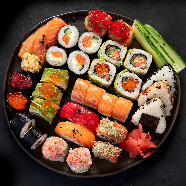 istock Sushi Set. Rolls, sushi of different types on a plate. 2233283012