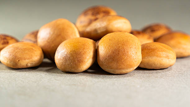 istock Delicious golden baked goods on a gray surface. 2233283349