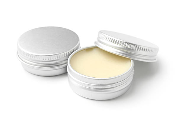 istock Lip balms isolated on white. Cosmetic product 2233284424