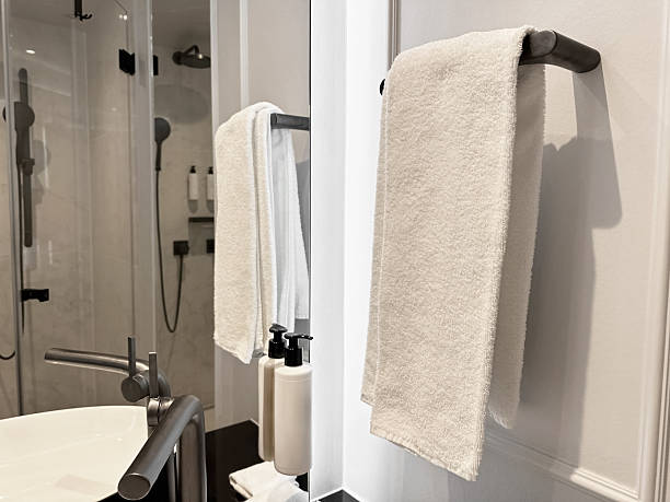istock Clean terry towel on rack near mirror in hotel bathroom 2233284873