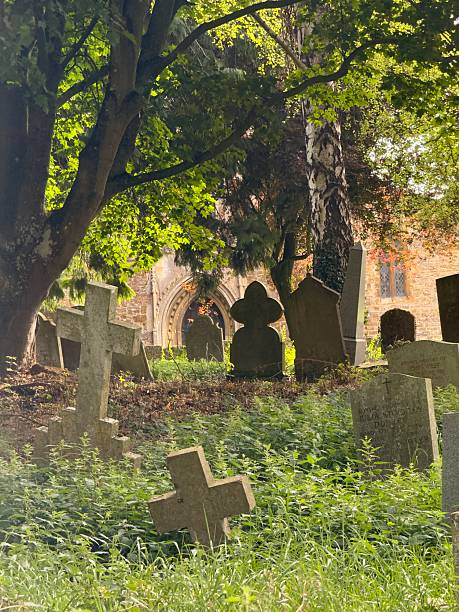 istock Gravestones Under The Trees, Byfield, Northamptonshire, England 2233284877