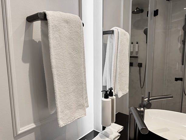 istock Clean terry towel on rack near mirror in hotel bathroom 2233284895