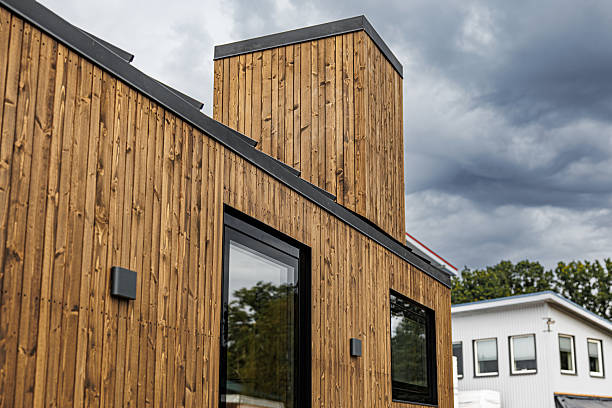 istock Modern Wooden House with Vertical Cladding and Large Windows 2233287661