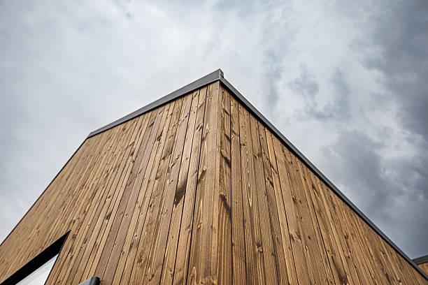 istock Modern Wooden House Corner with Vertical Timber Cladding 2233287665