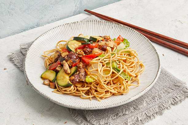 istock Asian noodle stir-fry with tofu 2233289832