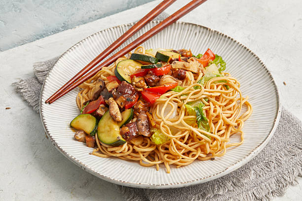 istock Asian noodle stir-fry with tofu 2233289833