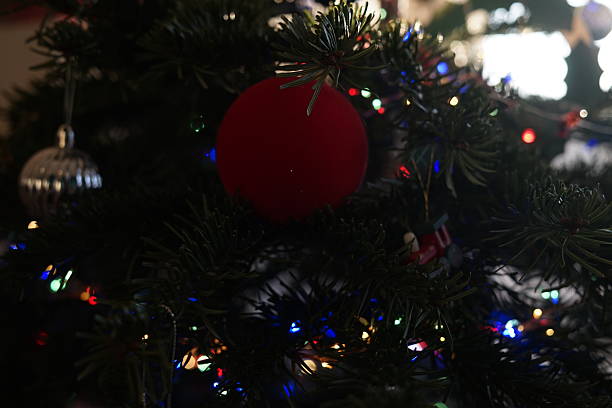 istock Festive Christmas Tree Ornament with Colorful Lights 2233290746